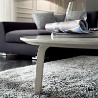 Percival ecru coffee table - top and slightly rounded leg detail
