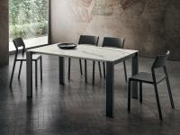 Minimal design for the Davis table with charcoal grey lacquered metal legs