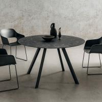 Jason round and modern living room table with tilted legs