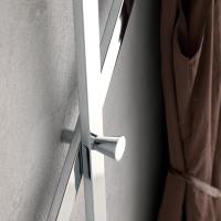 Detail of the functional chromed metal knob of the coat rack Trio