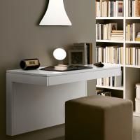 Kosmos wall mounted console table used as a desk