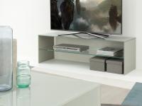 Detail of the tempered glass aTV stand with set top box shelf