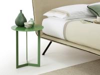 Danny round side table used next to the bed as a bedside table