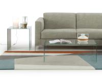 Couple of Multiglass occasional tables, in front and on the side of the sofa