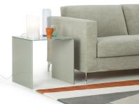 Multiglass square end table, next to the sofa