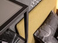 Detail of the aluminium frame of the Batuan bookcase, available anodised black or painted in different metallic finishes