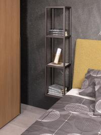 Batuan vertical bookcase element in an original bedside table-bookcase hybrid use. The high variety of sizes and shapes allows for total experimentation