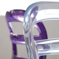 Lilian two-coloured modern chair - a detail of the polycarbonate back 