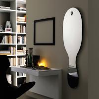 Julius shaped mirror with customised design, complete with decorative stud
