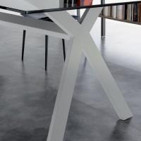 Captivating "X" shape of the Bount table's painted metal legs