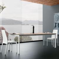 Main extending table with triangular legs available in 3 sizes