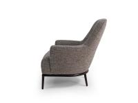 Side-view of the Esme armchair with reclined backrest