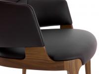 Close-up of the seat and armrests upholstered in the full-grain Lord leather in a dark brown shade