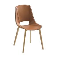 Nicole chair covered in cognac coloured bonded leather