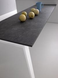 Detail of Clancy wall-mounted table with Delta leg and graphite Cleaf laminate top