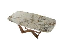 Reverse table with top in Symphony Gres stone and base in Brushed Copper metal