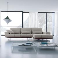 Axel sofa with sliding backrests