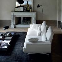 Axel sofa with manual sliding mechanism of the backrest
