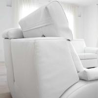 Detail of the back of the sofa with reclining headrest
