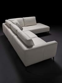 Detail of Abby sofa from the back covered in white leather