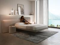 Cooper double bed with wide headboards and thin bed-frame for a "floating" effect