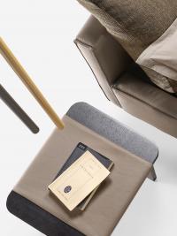 Detail of the bedside table Ametista with a top coated in leather