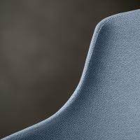 Detail of the shaped, upholstered and fabric covered backrest