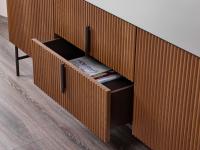 Savannah ash sideboard central drawers with metal handles that echo the workings of the doors