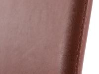 Detail of stitching to match faux leather upholstery