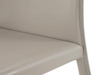 Detail of the connection between the seat and back of the Denali chair all covered in leather
