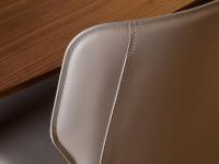 Detail of the shaped backrest and stitching to match the real leather upholstery