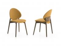 Designer chair in bent wood with upholstered seat and back