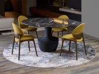Jewel chiars combined with the elegant Anfora dining table
