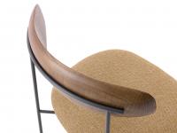 Detail of the curvature of the solid wood backrest that accommodates and supports the back perfectly