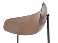 Detail of curved solid wood backrest, walnut-stained ash finish