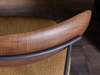 Detail of the walnut-stained ash finish of the solid wood backrest