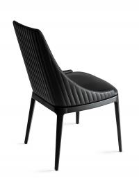 Lora upholstered chair with stitching and wooden legs in the quilted backrest version