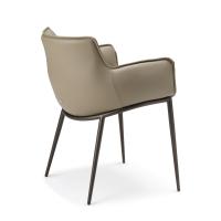 Back of Rhonda chair, upholstered seat and back and embossed metal structure in GFM18 bronze