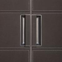 Elegant built-in metal handle with faux-leather cover