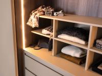 Close up of the cubby storage resting on the drawer units and the interior lighting with milled LED bars on the sides