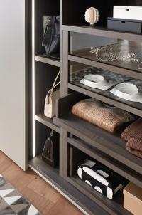 Detail of the vertical LED bar (on a sliding wardrobe) and the pull-out tray