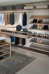 Joyce Pacific walk-in closet with practical shoe-rack shelves