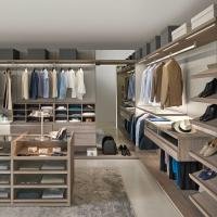 Joyce Pacific corner walk-in wardrobe fitted with shelves, hanging rails, LED light, drawers and trouser rack