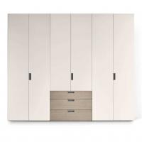 Wardrobe with doors and drawers in a central position