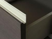 Close-up of the drawer with contrast edge which matches the finish on the doors
