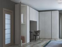 Pacific wardrobe with rounded-off corner - view of the interior in ‘Nature’ lotus melamine, matching the doors and sides