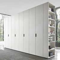 Practical shelves for the Pacific wardrobe with bookcase, available in textured melamine, matte lacquer and veneer wood
