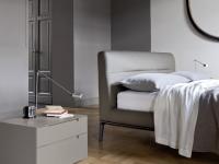 Close up of the metal base - upholstered bed frame and headboard