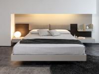 Bedroom set with bed, wall panels, shelving unit and bedside tables from California collection