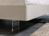 Detail of the transparent methacrylate feet which gives a sort of "floating" effect to the bed